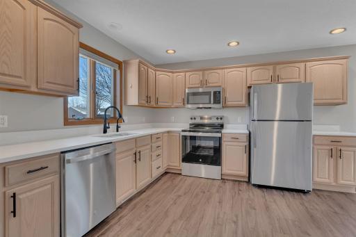 Beautiful Quartz Countertops, New High Grade Laminate Flooring, New Stainless Steel Appliances