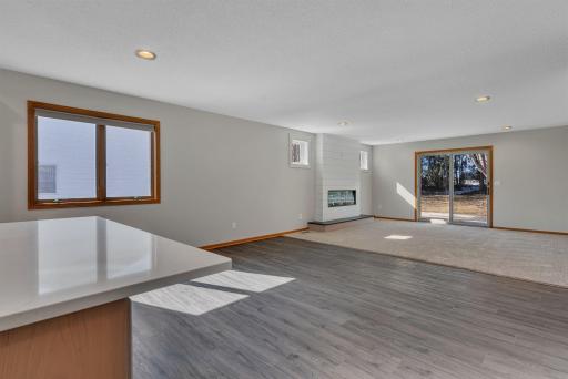 Kitchen Opens to Dining Area, Living Room and Also Boasts New Flooring, LED Canned Lighting and 2 South Facing Windows that Let in that Natural Light