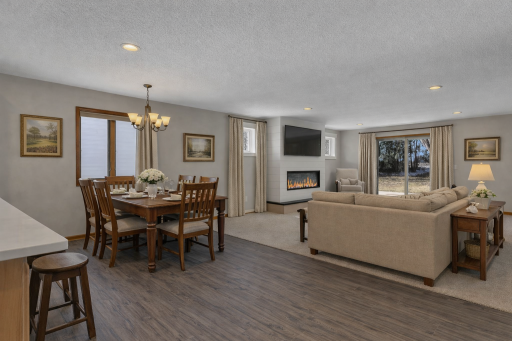 AI STAGED; Modern open-concept living and dining room.png