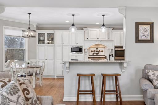 Cozy breakfast bar between the kitchen and great room