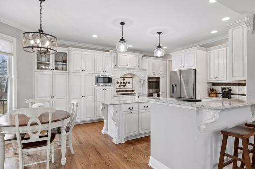 Chef's kitchen includes opulent touches like pull out drawers in the cabinets