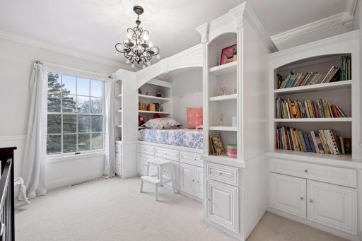 Really fun built-in bed and shelving in the second primary bedroom