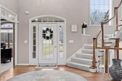 Impressive two-story foyer with a fairytale staircase