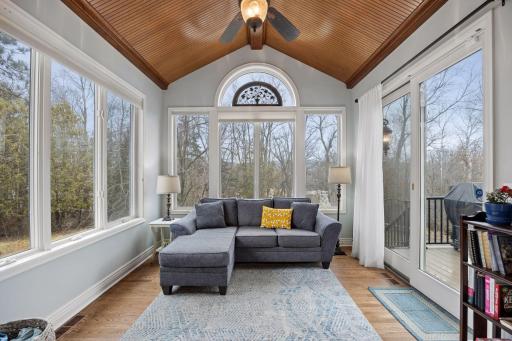 The sunroom has a door leading out to a deck
