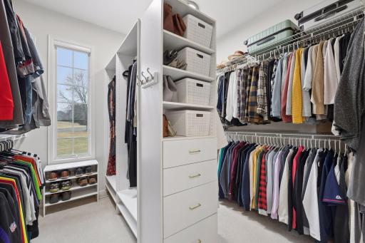 Enormous walk-in closet in the primary bathroom
