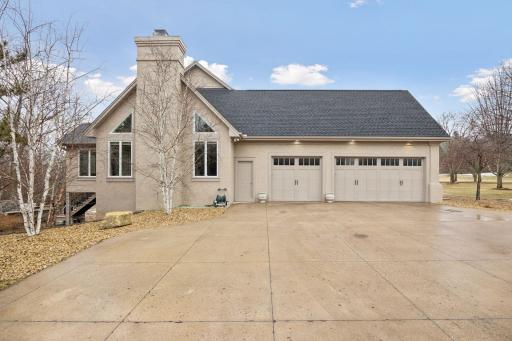 Spacious driveway and oversized three car attached garage
