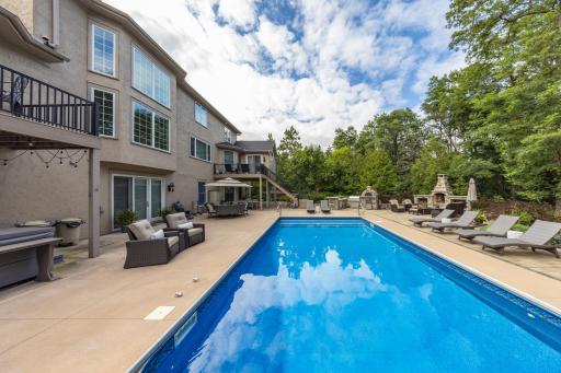 Inviting in ground heated pool with electric cover