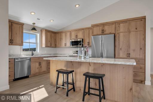 Features stainless streel high-end appliances