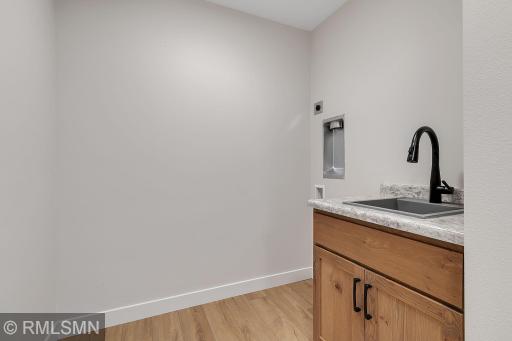 Laundry, large closet, and room for lockers