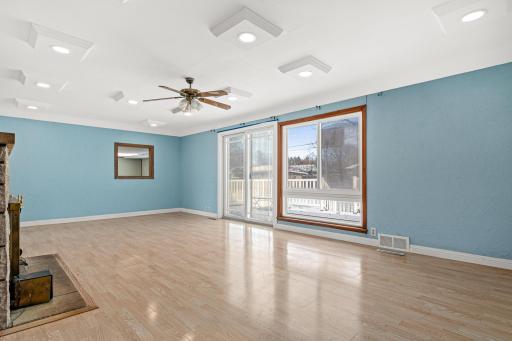 Formal Dining/Living Room has door that heads out to the large backyard!