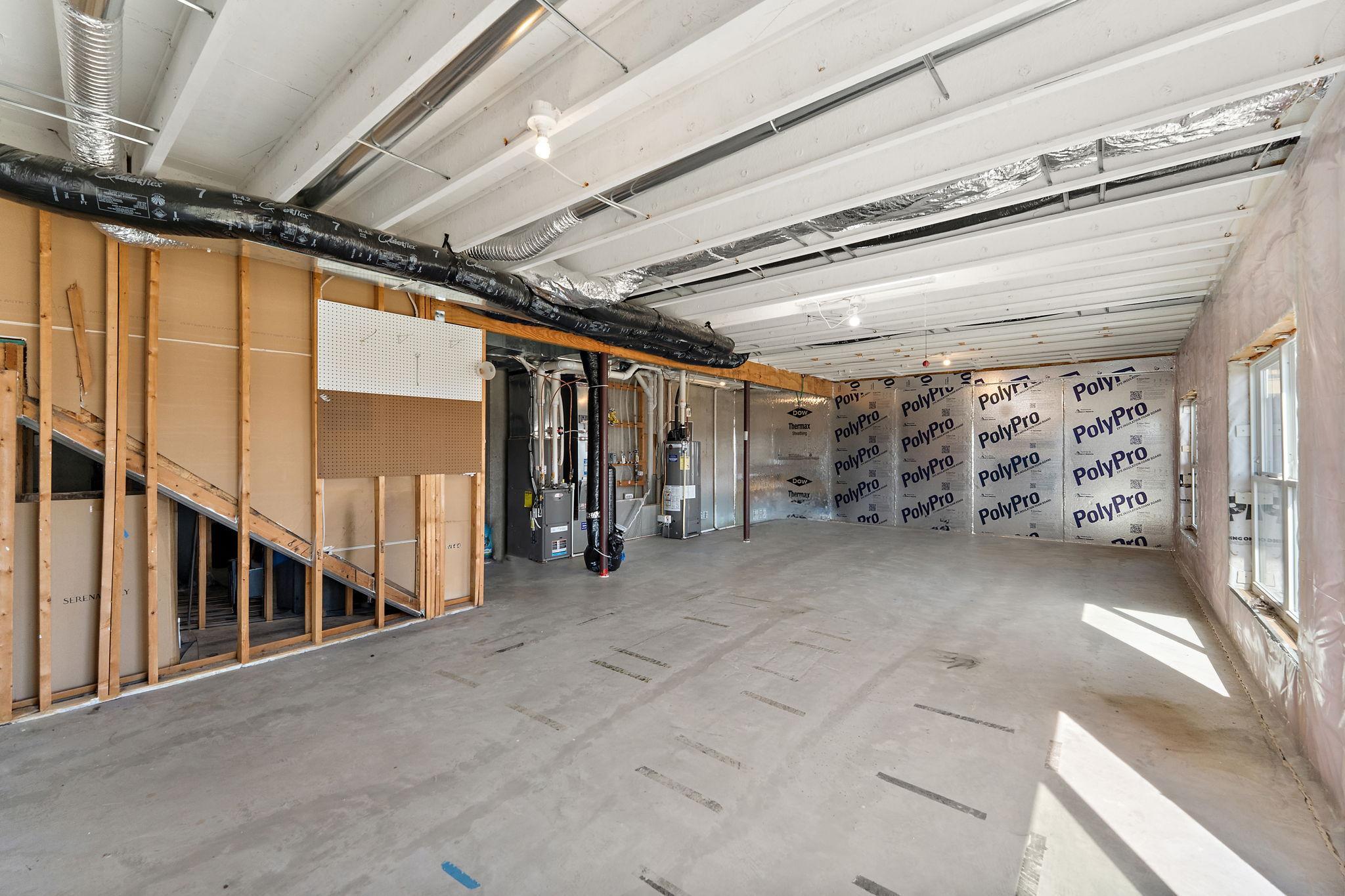 The massive walkout lower level is a blank canvas ready for your finishing touches! With high ceilings and plenty of light, it offers incredible potential to add a 4th bedroom, bath, and family room for instant equity.