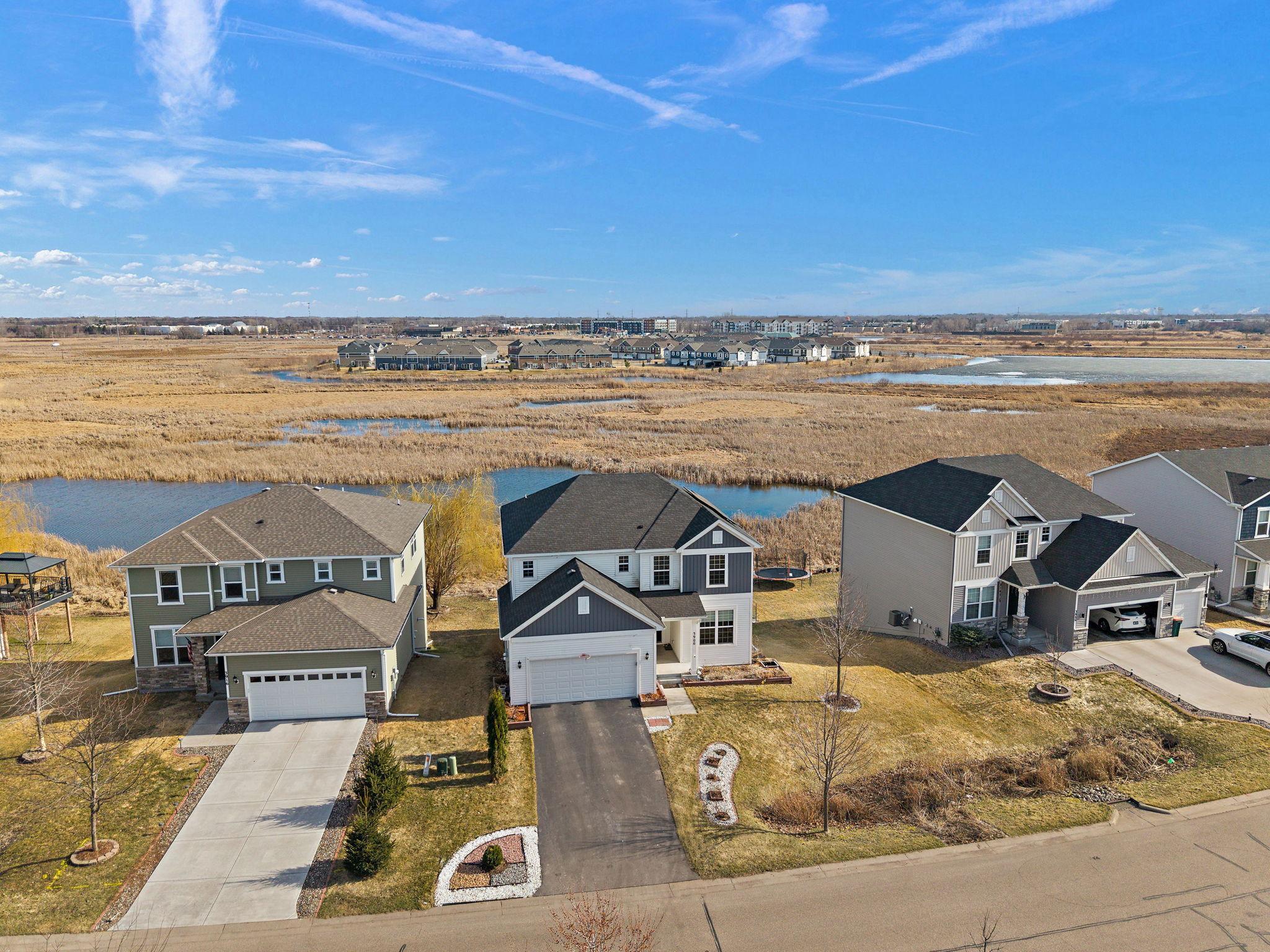 The rain garden and chemical-free lawn complement this preserve perfectly, making the entire property feel like an extension of the natural landscape.