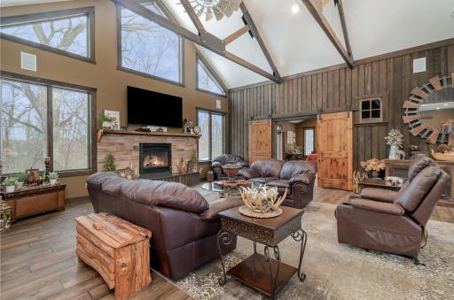 Cozy fireplace overlooking woodsng wood