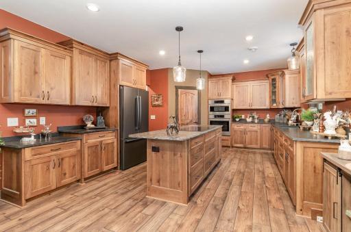 So much storage with cabinets plus TWO walk in pantries