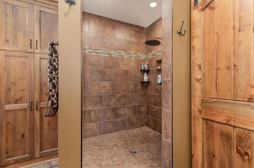 Huge tiled walk in shower in master bath