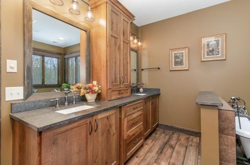 Master bathroom features dual sinks, separate soaking tub and HUGE walk in shower