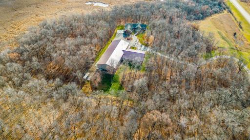Home is surrounded by 64 wooded acres!