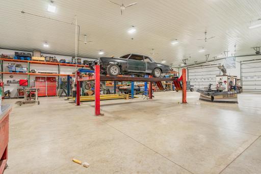 Shop-great lighting/fans/floor drains! Two garage doors off of front of building