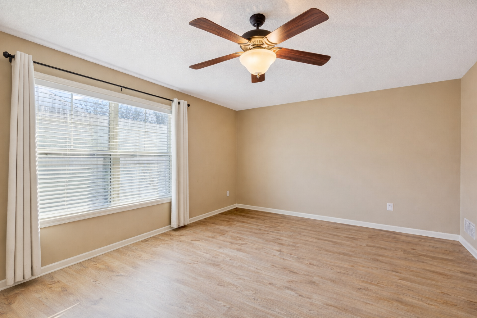 Primary bedroom is generously sized and makes for the perfect retreat!