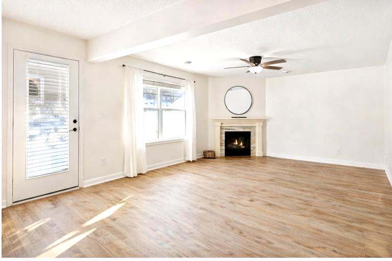 Living room with gas fireplace.