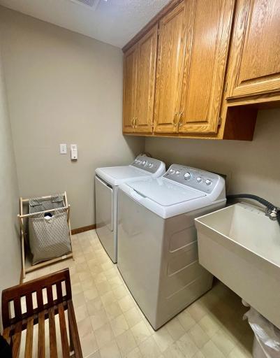Laundry off of garage entrance - new washer and dryer