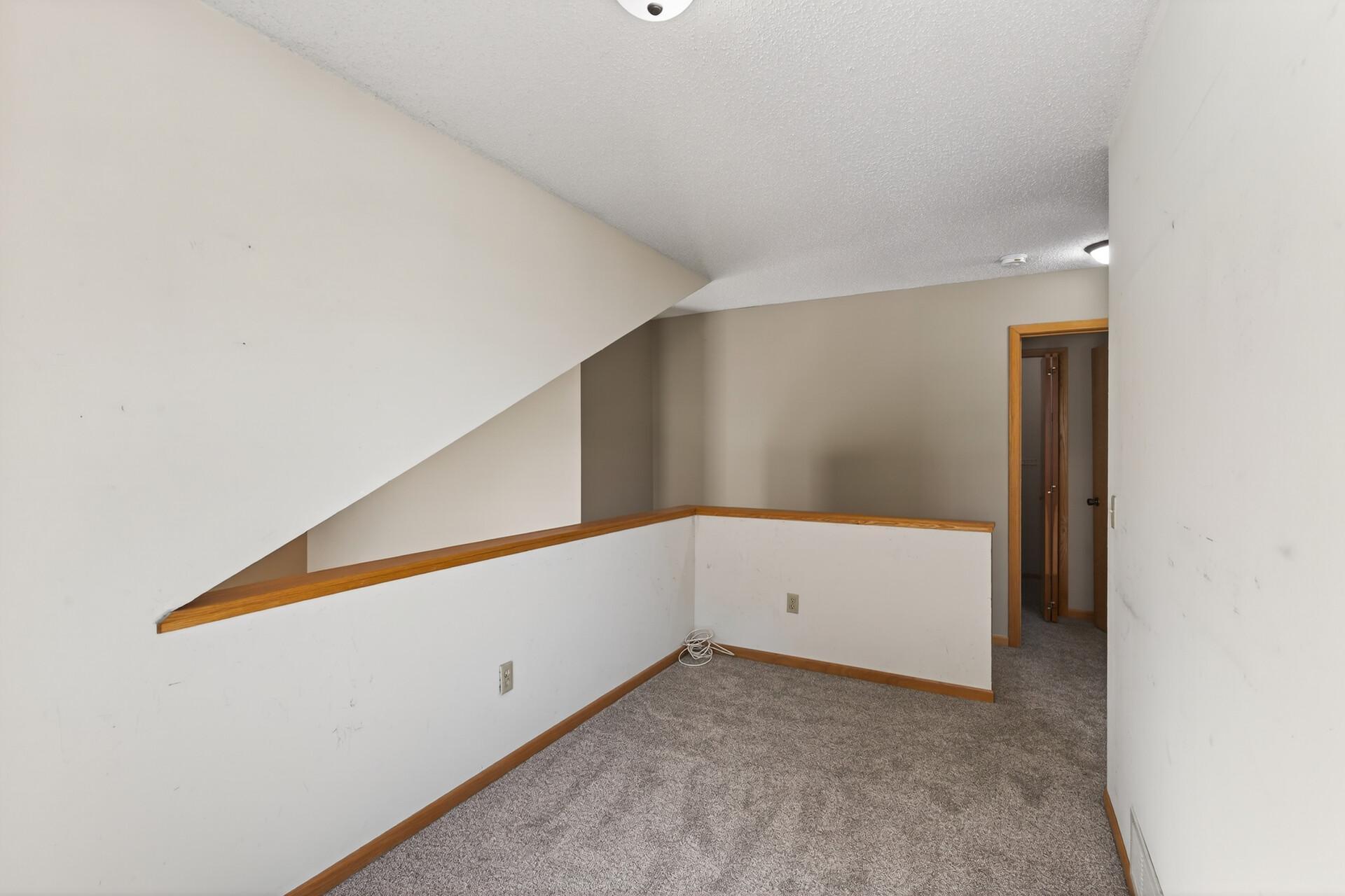 Loft Overlooking Living Room Area