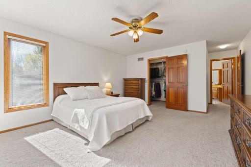 Ceiling fan for all season comfort plus walk in closets offering ample storage.