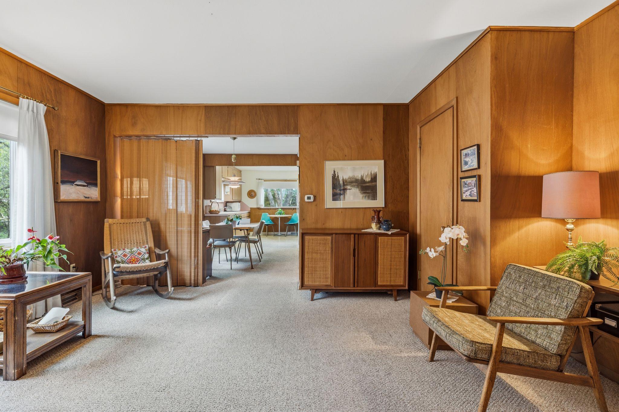 A large coat closet on the right provides ample, discreet storage near the main living area. This perspective showcases the room’s clean lines and effortless transition into the rest of the home.