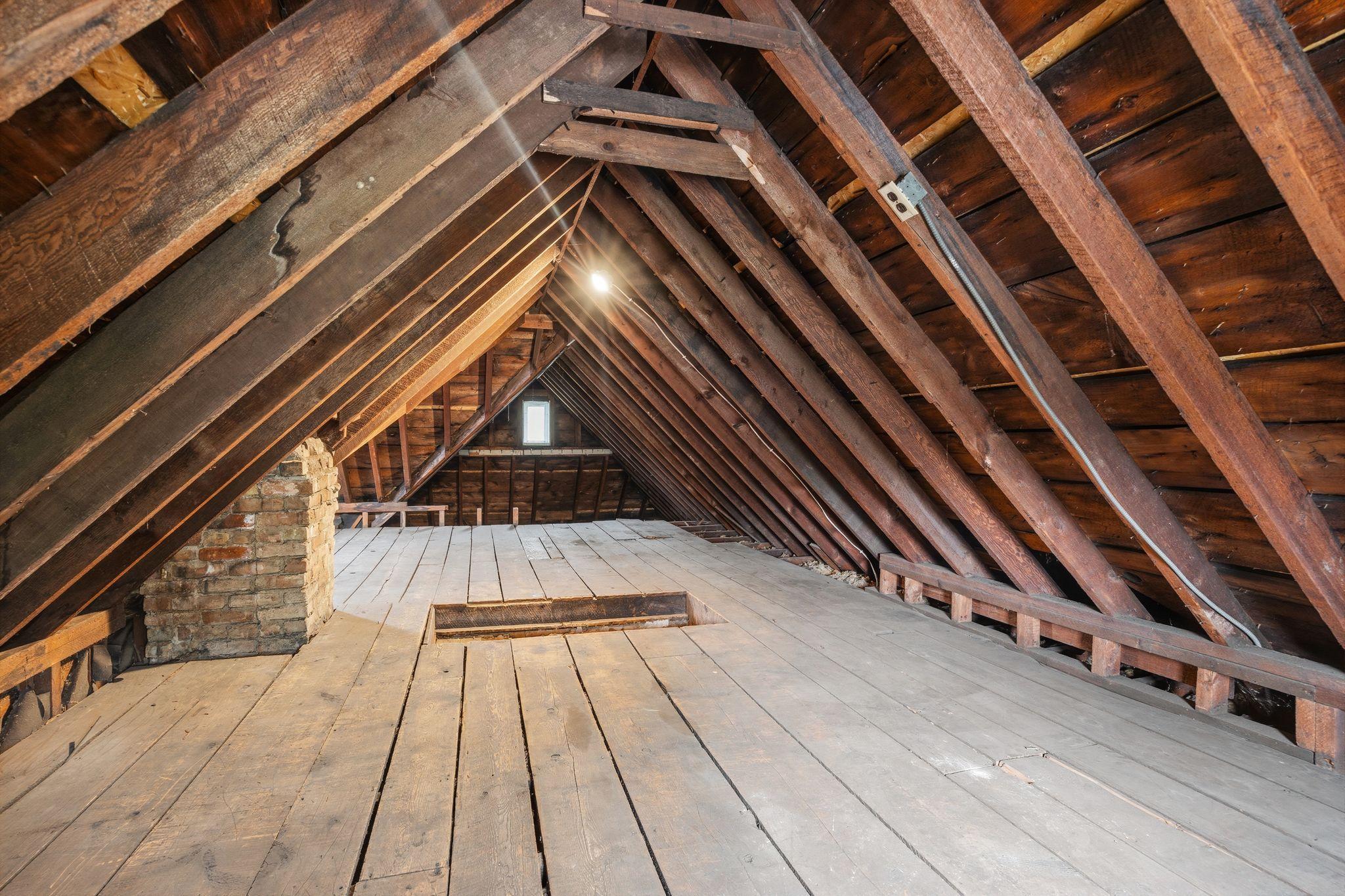 Attic - This unfinished attic has lots of storage space or could be equity potential once remodeled.