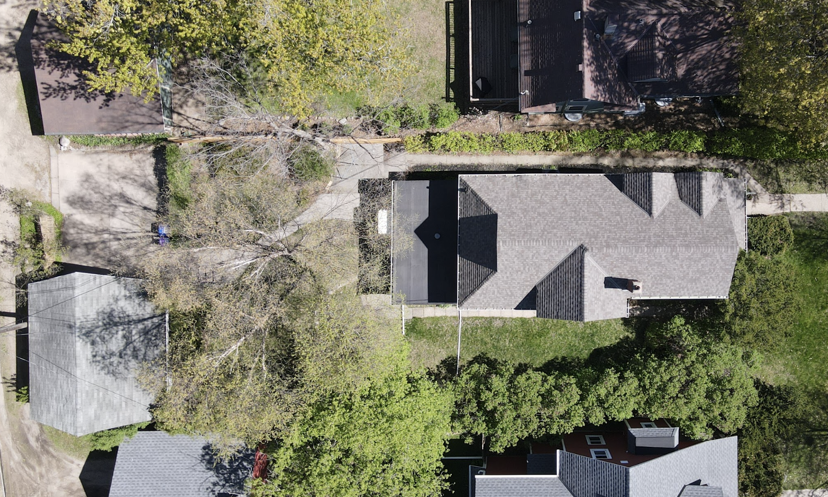 Drone photo - View of the top of the house and yard