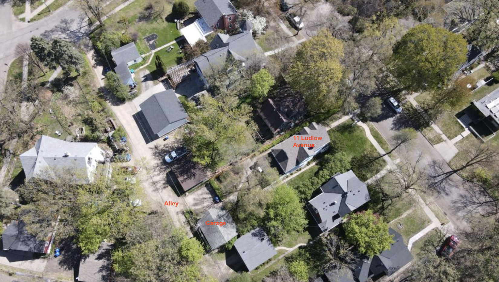 Drone photo - Top of the house showing alley access to the garage.