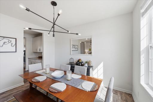 Additional dining area view with a peek into the butler's pantry.