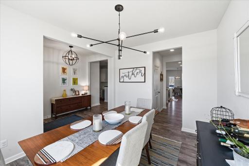 Modern Lighting and white enamel accent the rooms