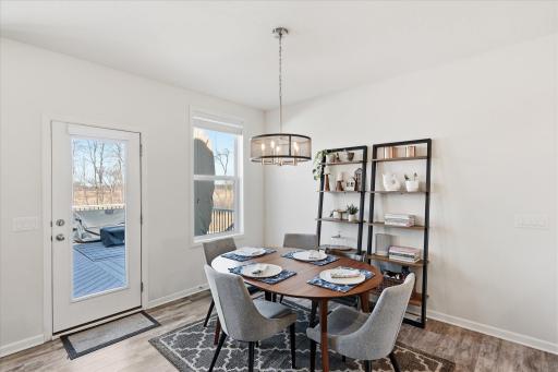 For the outdoor lovers, there is access to the deck from the dining area. It won't be long for grilling season.