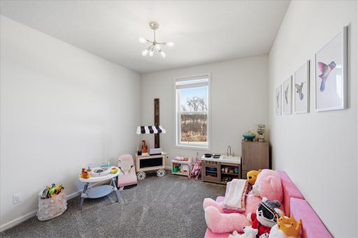 A main level play area could be a multi-purpose room. Need a private home office, guest room, or 6th bedroom? There are options for this space.