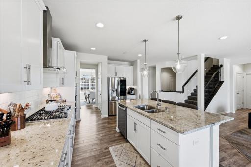 Kitchen's are often the HUB of a home. The layout here is so functional to create just that. Whether you are meal prepping, entertaining, or just hanging out, the kitchen is set up to be all inclusive with the main living space.