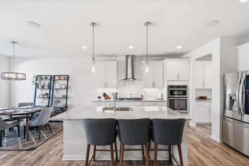 The center island offers more seating and a breakfast on the go option.