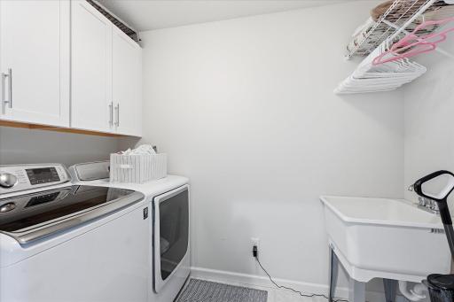 The Upper level hosts the laundry area so there is no need to haul clothes up flights of steps.