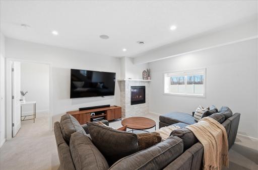 A fifth bedroom is just past the doorway. This level would make for a great extended multi-generational living space.