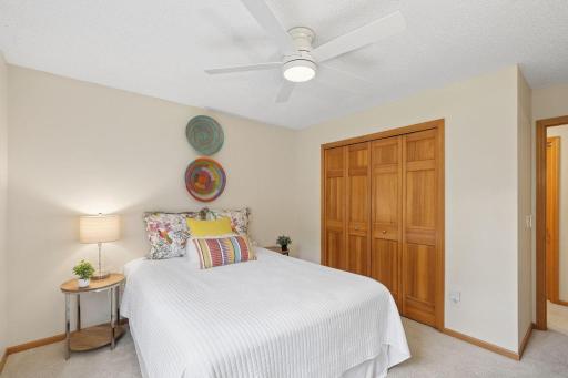 New fan, large closet and room for desk or reading corner.