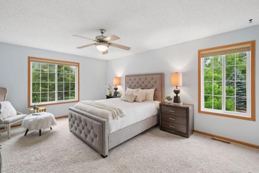 Expansive primary suite with custom walk-in closet!