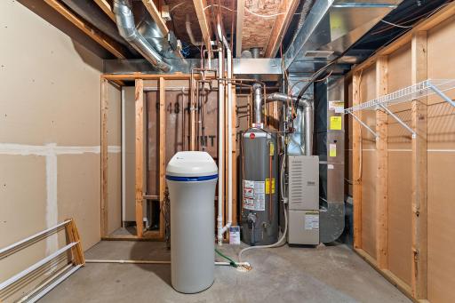 Lower level utility room with extra room for storage