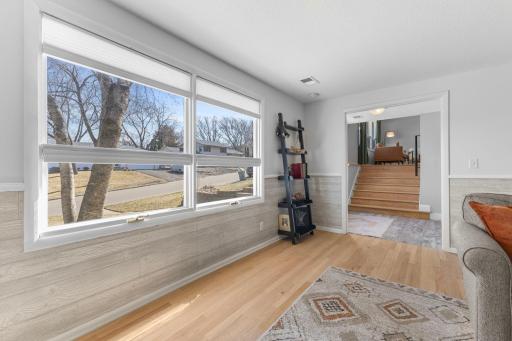 Look how the windows brighten up the room and the new hardwood floors