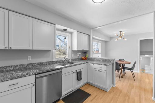 Updated kitchen w/stainless steel appliances and new hardwood floors