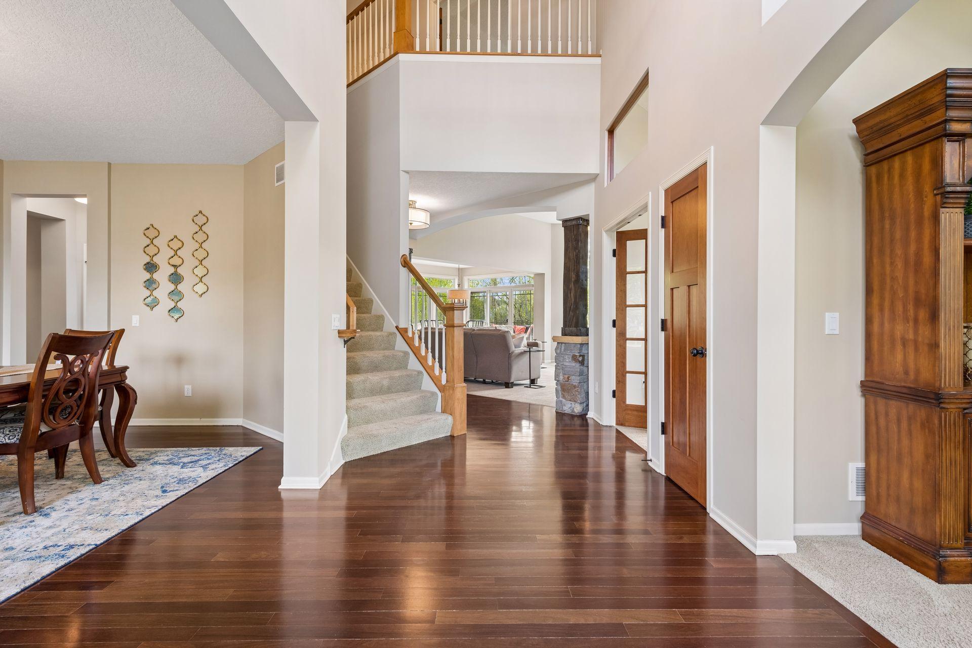 Grand vaulted entrance leading to second family room and formal dining room