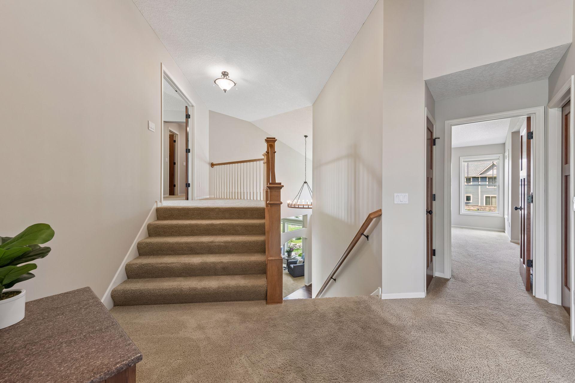 Come upstairs to find 4 bedrooms & 3 bathrooms