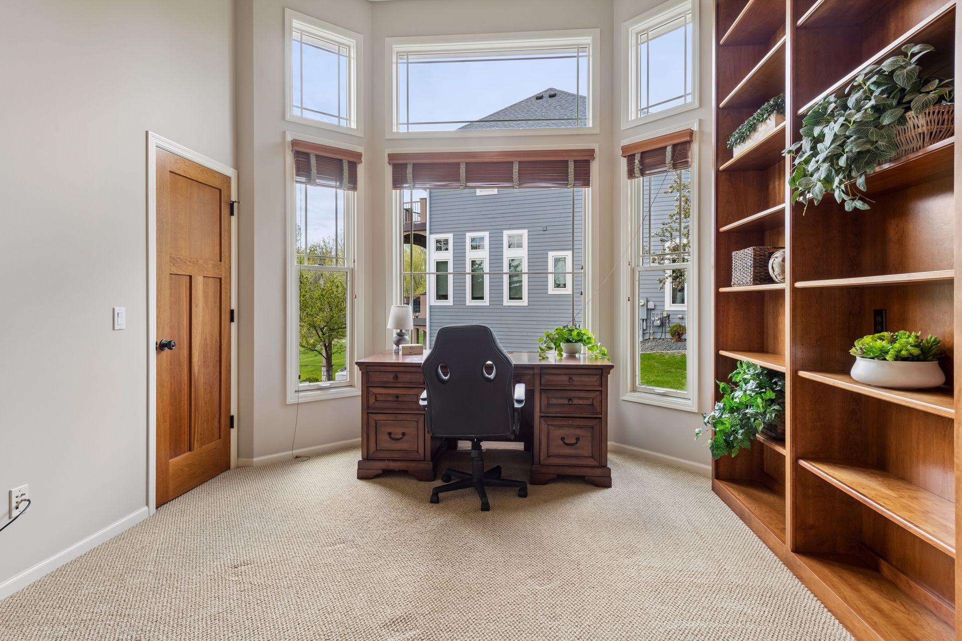 Floor to ceiling book shelf & tons of natural light