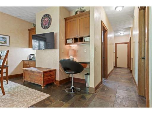 Back Hallway Off Informal Dining Leading to Garage, Laundry, Office and Bathroom