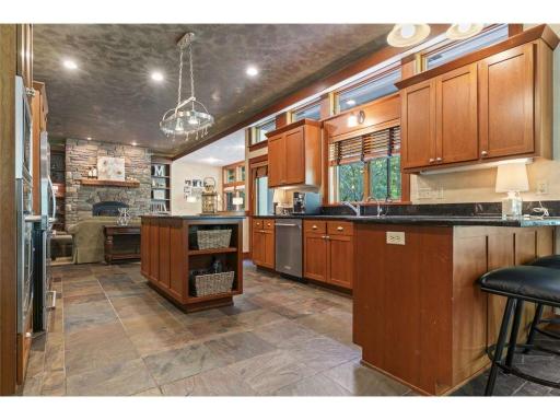 Breakfast Bar Between Kitchen and Informal Dining Room