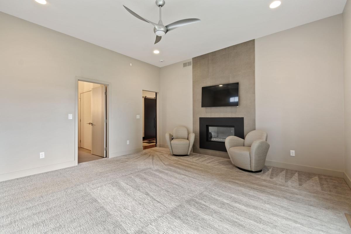 Primary Main Floor BR with fireplace - attached bathroom